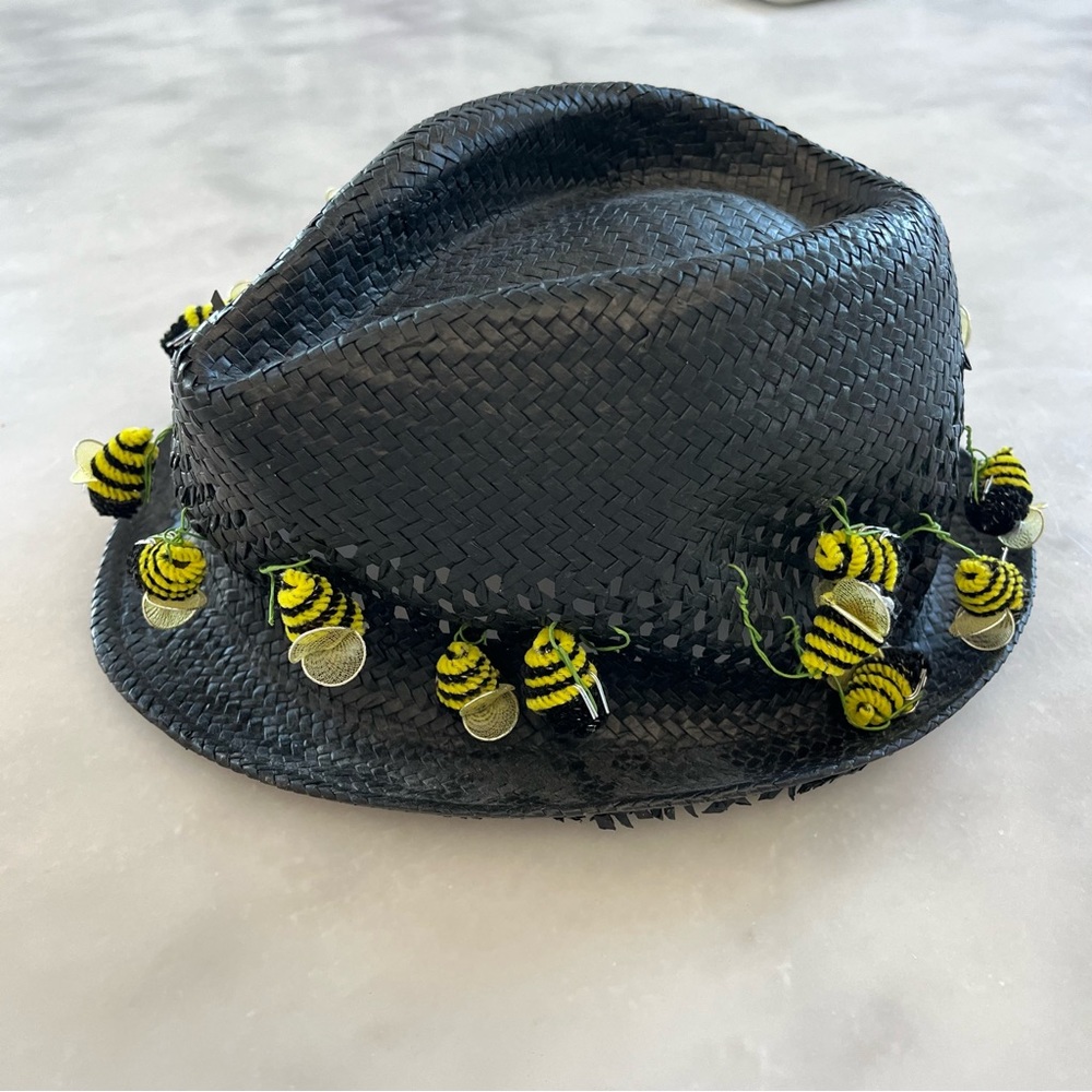 Black straw fedora like hat styled with honey bees. M